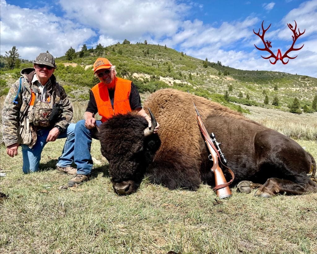 Buddies after a successful day of bison hunting.